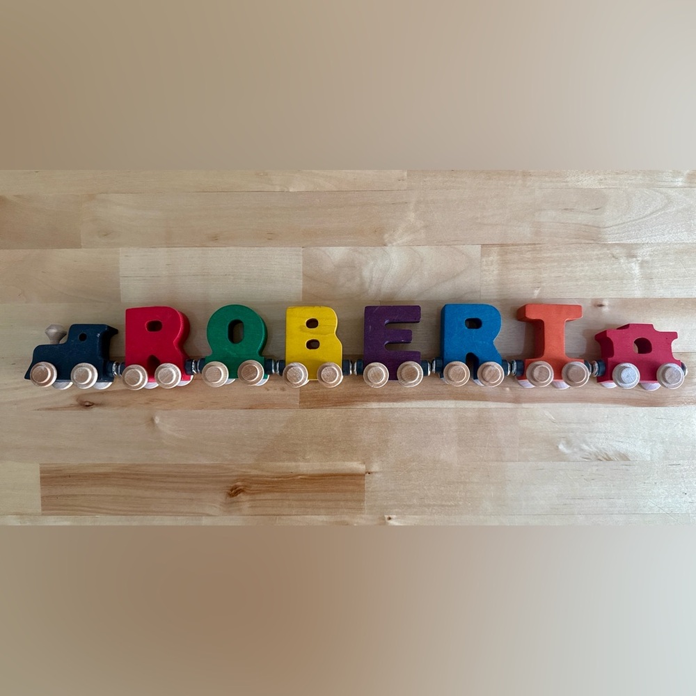Maple Landmark NameTrain set spelling the name "ROBERT".